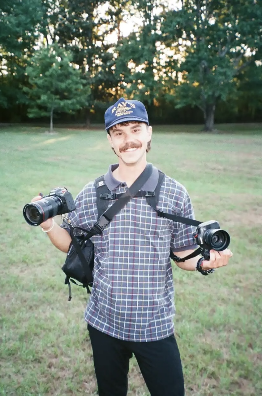 John with cameras in the field